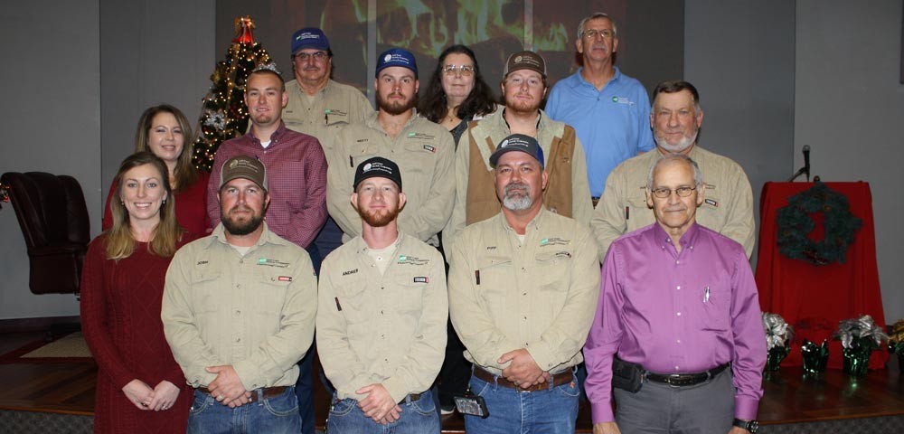 Employees recognized for service anniversaries included, front row, from left, Megan Whitfield, Josh Harbuck, Andrew Taylor, Chris Pippin and Carl Elmore. Middle row, from left, Teresa Chase, Colby Wiggins, Brett Satterfield, Ron Groom and Hal Walden. Back row, from left, Ken Newsome, Manuela Heyn and Harold Ruth.